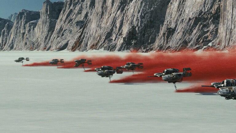 Resistance ski-speeders cutting red mineral dust trails across the white salt flats of Crait